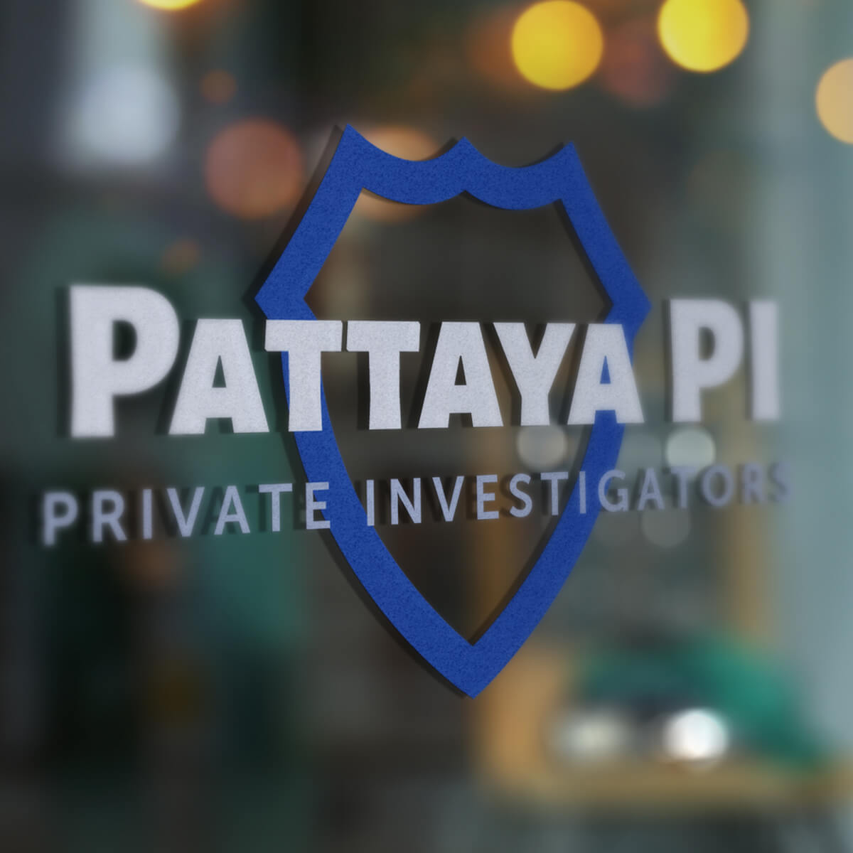 Pattaya Private Investigators logo on glass door